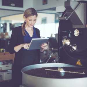 Woman roasting coffee
