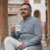 Man holding Retired Nutritional Facts Mug